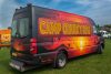 orange-van-with-camp-quirky-2018-written-on-the-side_fi